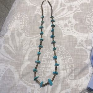 Vintage Turquoise and shell Native American necklace with Sterling Silver clasp.